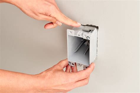 how to install an electrical box between studs|installing wall mounted electrical boxes.